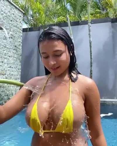 Bathing her tits