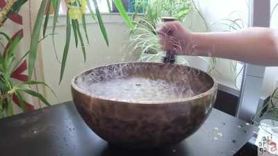 A Singing Bowl With Water Inside