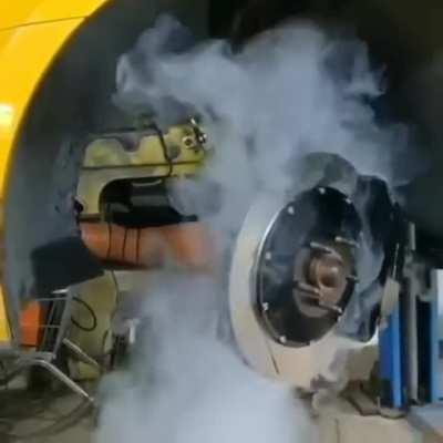 Smoke shows how passive airflow is used to cool disc brakes