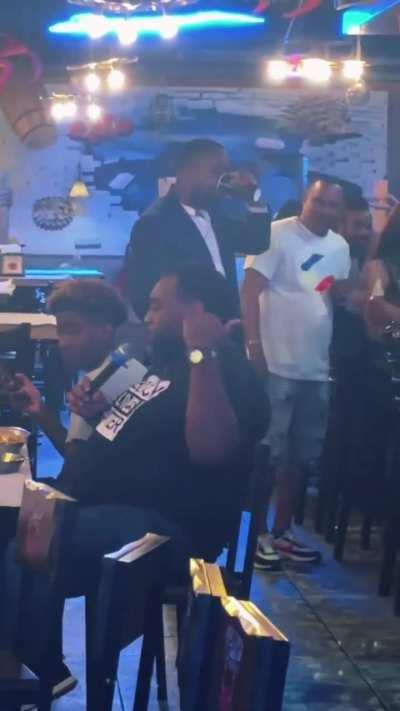 Guy at a karaoke bar in Atlanta nails Biggie and Ronald Isley's vocals while performing a mashup of the songs 