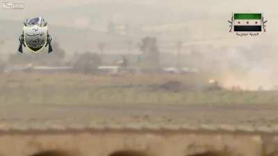 FSA ATGM team engages a Syrian Army tank caught in an open field - 2014