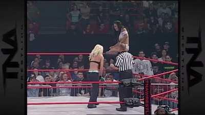 Gail Kim caught crotch first on the ring post