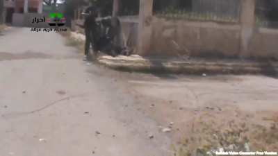 FSA fighters provide cover & assistance to a wounded comrade caught under SAA fire - Khirbet Ghazala, Daraa - 5/10/2013