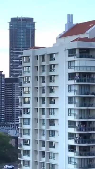 Flying a Boeing C-17 Globemaster through the middle of a city in Australia.