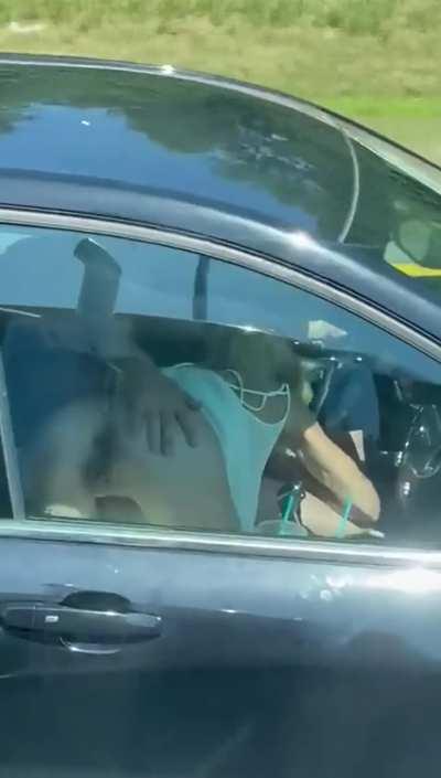 Getting head while driving