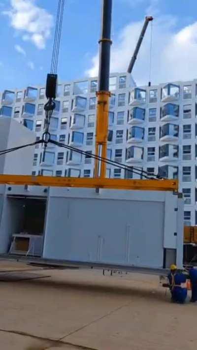 Modular residence in Changsha, China. Maybe this can solve the housing crysis?