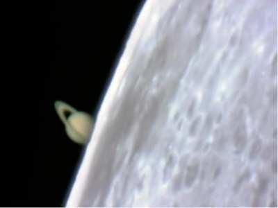 Incredible footage of Saturn rising from behind the Moon during a lunar occultation, captured from a ground based telescope by astronomer Jan Koet.