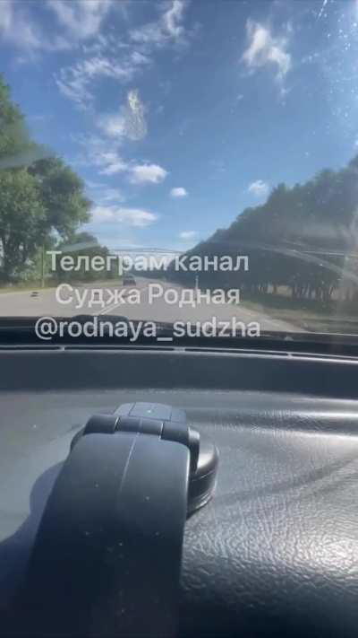 Russian civilians driving around the outskirts of Sudzha with gunfire all around them, they're also dodging anti-tank mines placed on the roads.