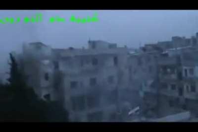 Dhu al-Nourin Battalion fighters expend a lot of ordinance on a building purportedly containing a group of SAA soldiers - Februrary 2012