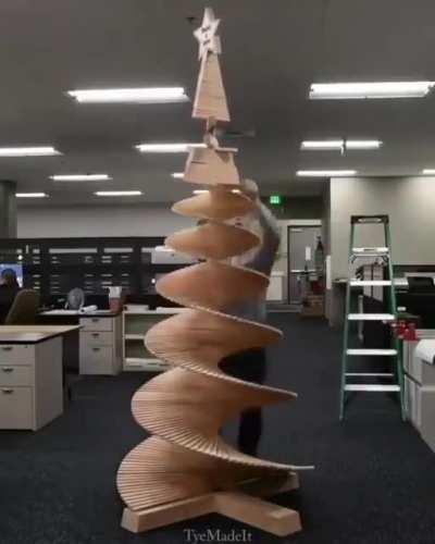 A Christmas tree made out of wood