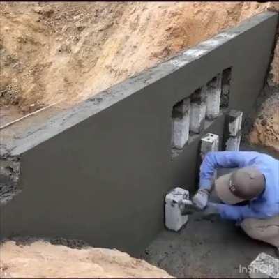 Man casually builds a dam all by himself