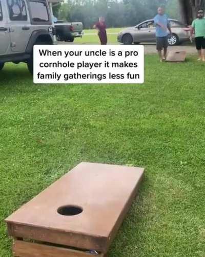 Playing cornhole with a pro player