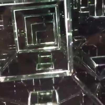 This “Tesseract” sculpture is a 4th dimension infinity mirror