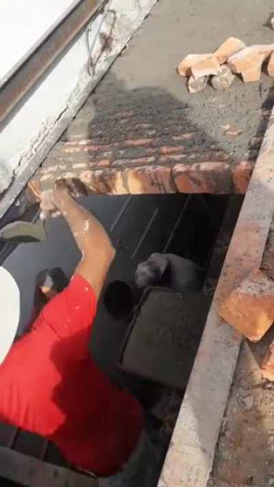 Brick laying on top of what? How is it staying put?