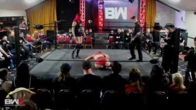 Saraya causing Eliza Roux severe pain