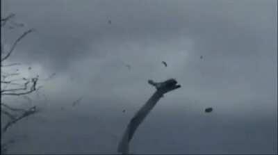 Windmill explodes during storm.