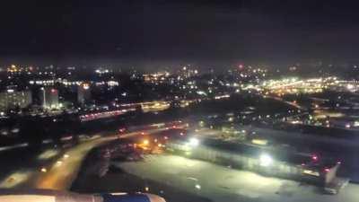 Fireworks as seen from a plane landing at JFK