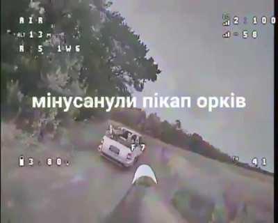 Ukrainian FPV drone strikes Russian pickup truck transporting Ukrainian POW