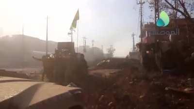 ISOF forces advance between a wall of .50 caliber while fighting IS forces in E. Mosul - 2016