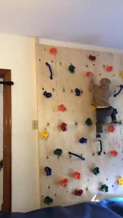 Father built his kid a climbing wall to get him to stop climbing furniture and it only made the tot more powerful