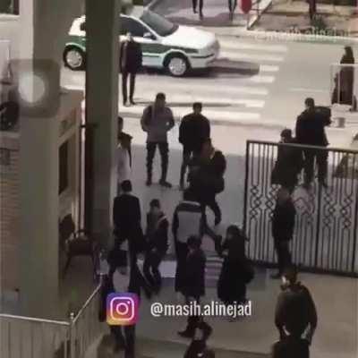 More footage of Iranians who try to avoid stepping on US and Israeli flags 