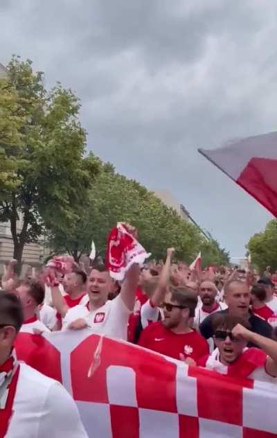 Polish football fans in front of the Russian embassy in Berlin singing ‘Ruska kurwa’