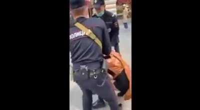 Young women detained by rosguardia thugs for 'filming in a public place' while dancing in Moscow city center.