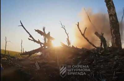 Ru AK gets tossed over a trench to Ukr forces after explosion.