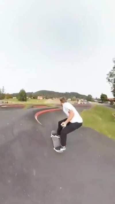 Stabilized video of guy on a skateboard pumptrack