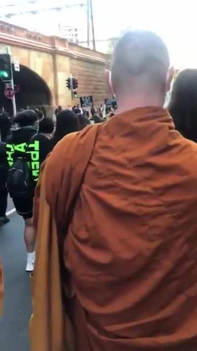 A new challenger appears: Buddhist monks have now joined the protests.