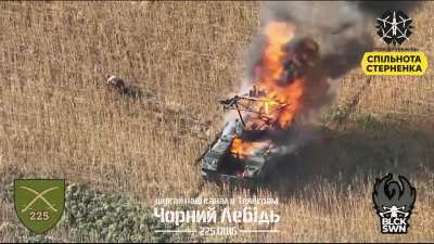 russian invader crawls away from his burning equipment. Spoiler Alert! He did not make it. 