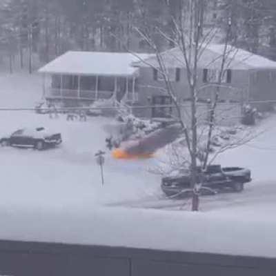 Clearing the snow with a Flamethrower