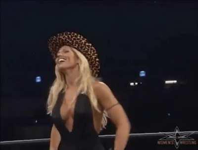 Torrie Wilson with the WCW World Tag Team Title