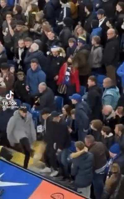 Chelsea fan boots ball into his mate's face. More info in comment.