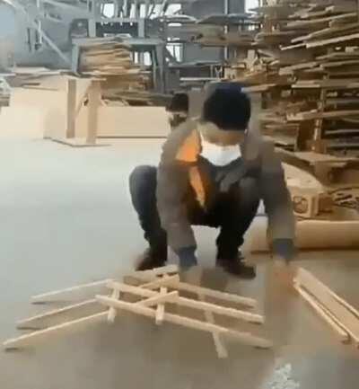 Making a DaVinci bridge out of a pile of wooden sticks