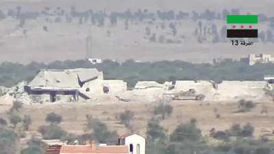 FSA 13th Division BGM-71 TOW strike on a Syrian Army T-62 al-Tarraf Military Checkpoint - 7/9/2014