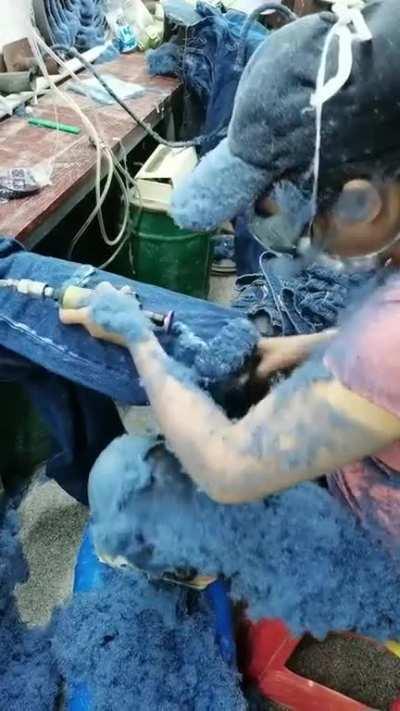 How holes in jeans are made