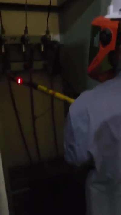 Safety Precautions Taken For An Electrical Worker In A High Voltage Area