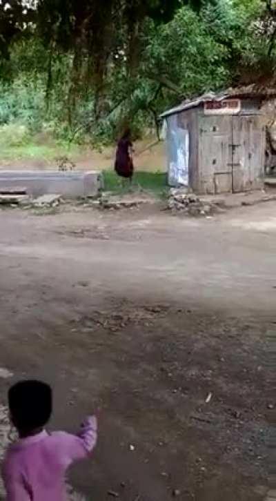 Old Indian lady yeets a cobra that wandered into her home