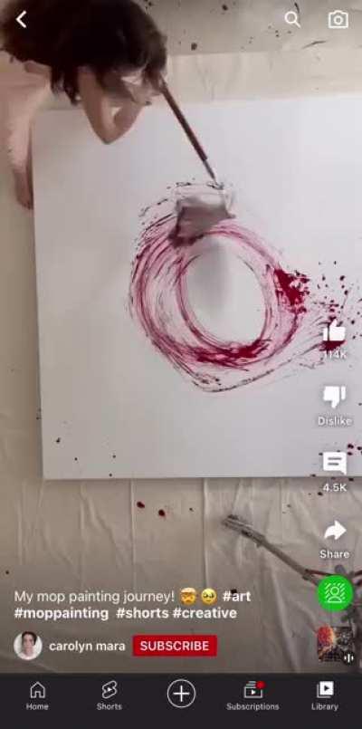 Lady uses mop to paint modern “Abstract art” sounds like money laundering to me.