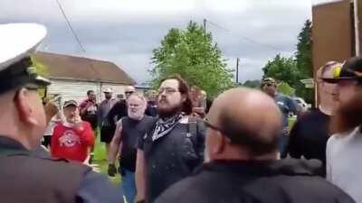 BETHEL, Ohio - while getting yelled at by an angry mob of Trump supporters, protestor gets PUNCHED IN THE BACK OF THE HEAD right in front of multiple police officers... who do nothing.