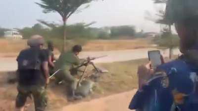 KNLA fighters firing an M2 Browning HMG at junta forces around Myawaddy, Myanmar