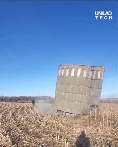 The way the silo falls after being knocked down by a sledgehammer