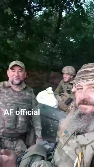 Ukrainian troops with their trusty pickup truck. Citizen soldiers defending their homeland.