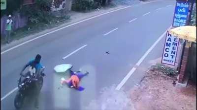 Woman Opens Up An Umbrella While Traveling On The Back Of A Motorcycle