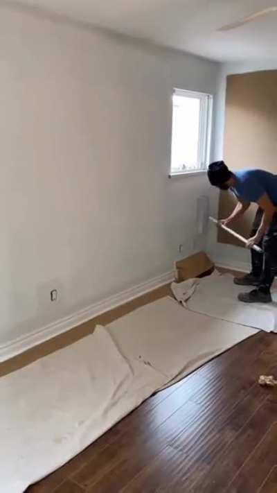 This wall being painted in about :45 seconds.