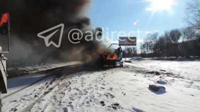 Russian BTR fighting in the outskirts of Kharkiv