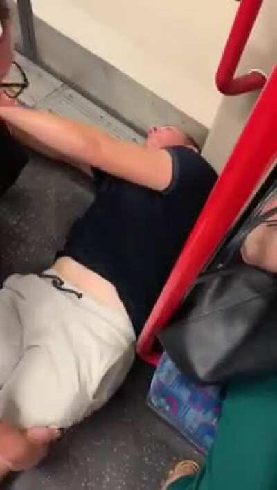 Non-masked racist gets what he deserves (London underground)