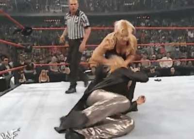 Trish Stratus, so pathetic with her thong hanging out, what a joke