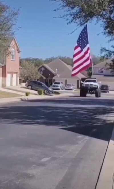 Huge flag on a pickup truck